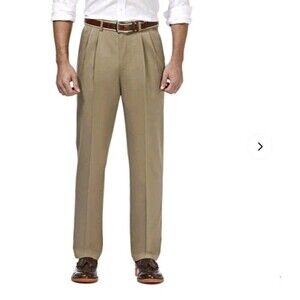 Haggar Dress Pants Size 40x29 Pleated Khaki Color Expandable Waist Band.